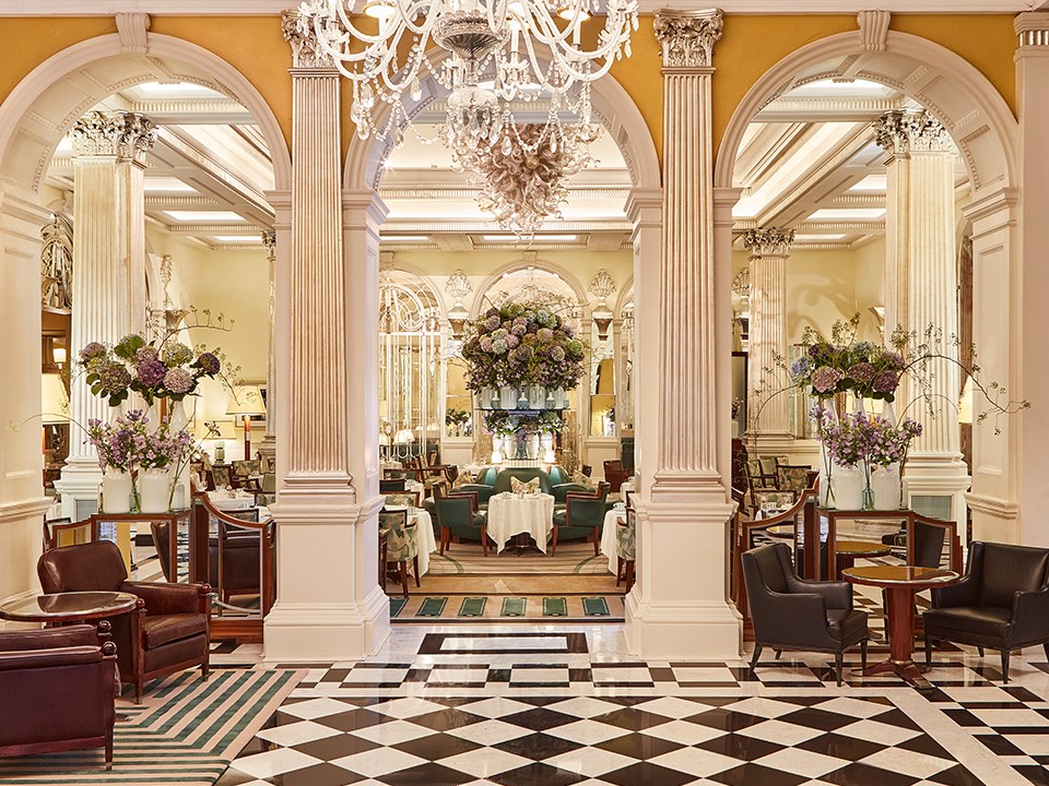 Art deco lobby, and the combination of elegance in the interior at Claridge's with magnificent flower arrangements.