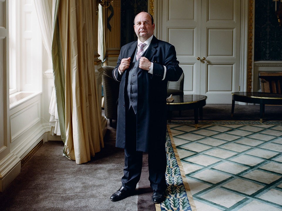 Portrait of The Hotel Ambassador, Martin Ballard, in the corridor of Claridge's Hotel.