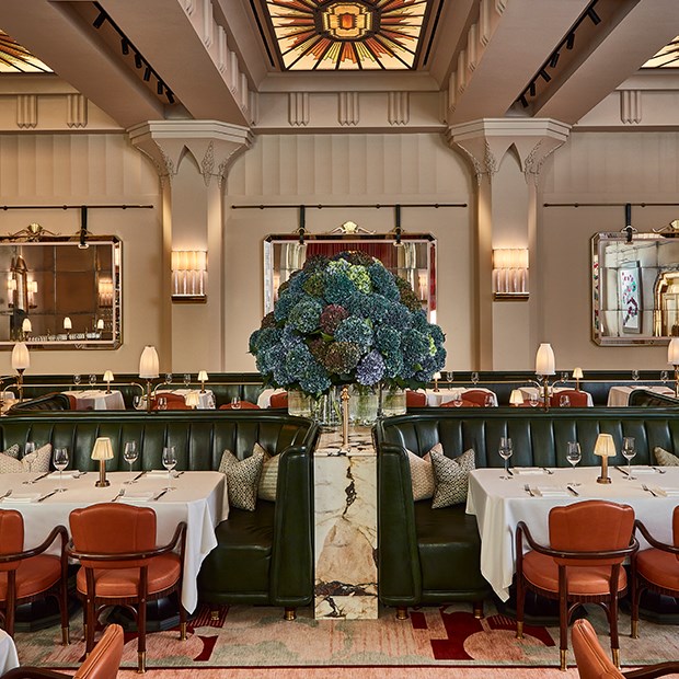 Claridge's Restaurant room with beautiful flowers and table dressed up.