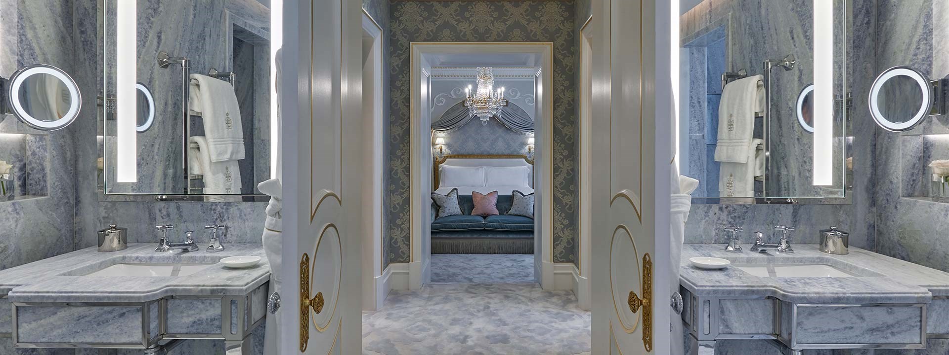 Royal Suite at Claridge's - bathroom view with marble bathtubs, marble walls and view to the bedroom.