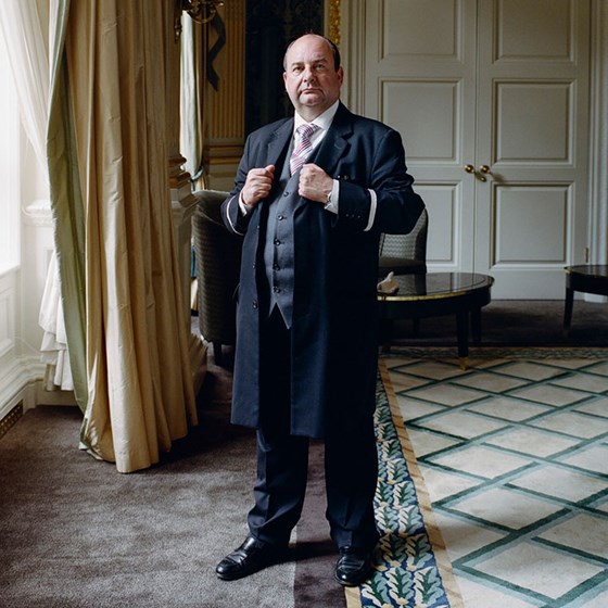Portrait of The Hotel Ambassador, Martin Ballard, in the corridor of Claridge's Hotel.