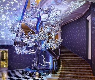 Claridge's Christmas Tree in 2018, designed by Diane von Furstenberg, called 'The Tree of Love.