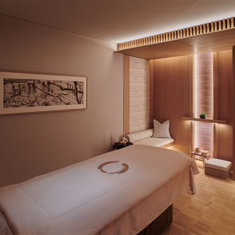 Claridge's spa treatment room, serene room with bed