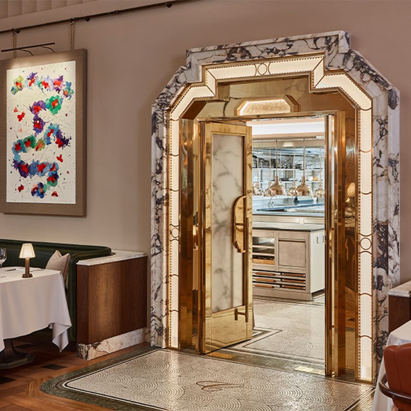 double doors open into the kitchen