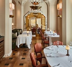Claridge's Restaurant corridor with tables