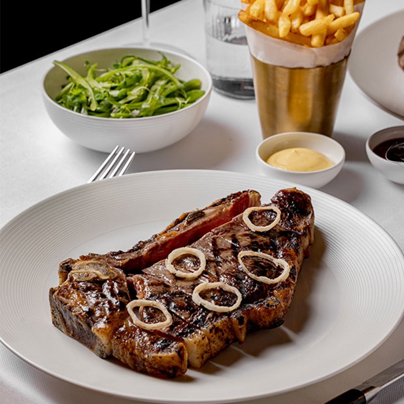 steak, chips and green vegetables