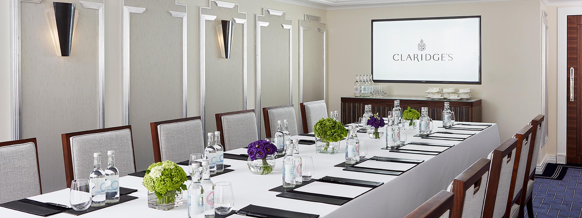 The sophisticated Boardroom, with flatscreen TV, is perfect for private dinners and business meetings.
