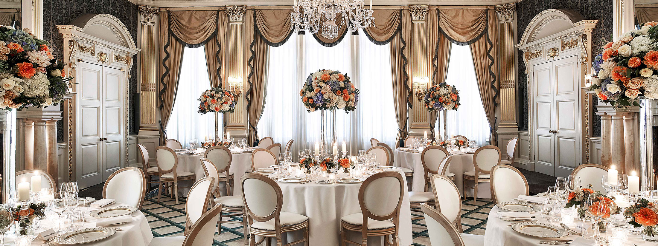 Transformed for the event, the Drawing Room looks stunning in champagne colours with floral arrangements.
