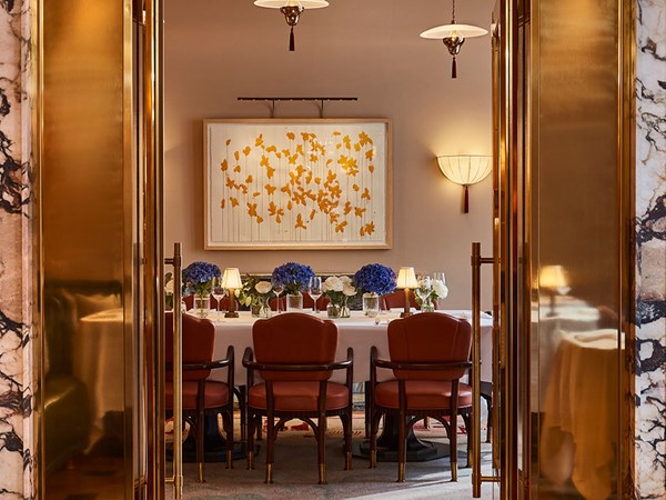 Private dining room at Claridge's Restaurant with a table and chairs