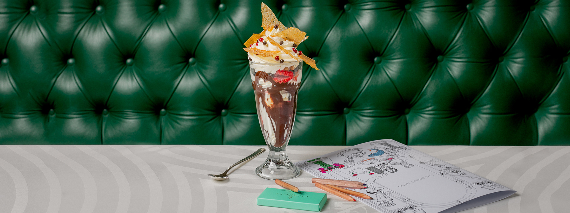 A colourful chocolate shake, from the children's menu, goes well with crayons and colouring books.