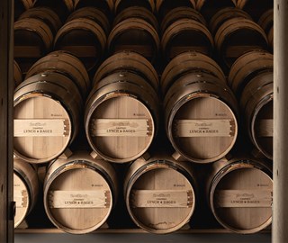 wooden wine barrels printed with Château Lynch-Bages