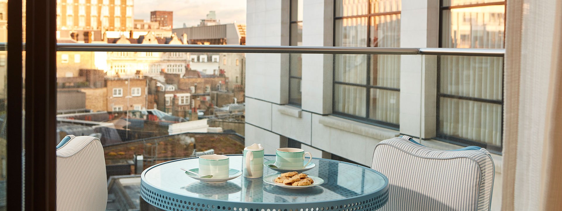 claridge's balcony room table chairs and view