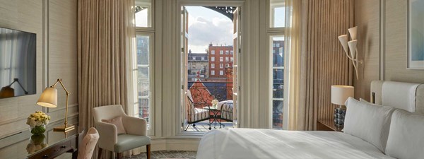 View from the terrace bedroom in Claridge's Terrace Suite, with lots of daylight and elegant design.