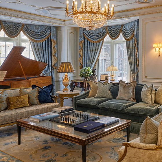A sumptuous interior in Victorian design, with comfortable sofas in the Royal Suite at Claridge's Hotel.