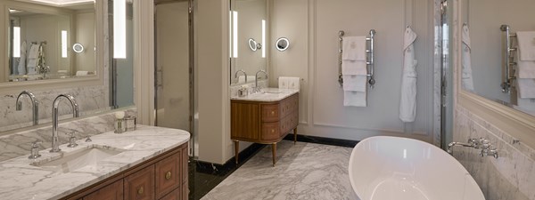 Elegant bathroom design from The Octagon suite, complete in Calcite Azul Quartzite stone.