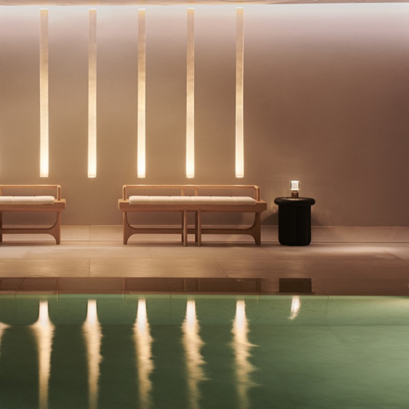 A view of the pool benches and the soothing atmosphere at Claridge's Spa.