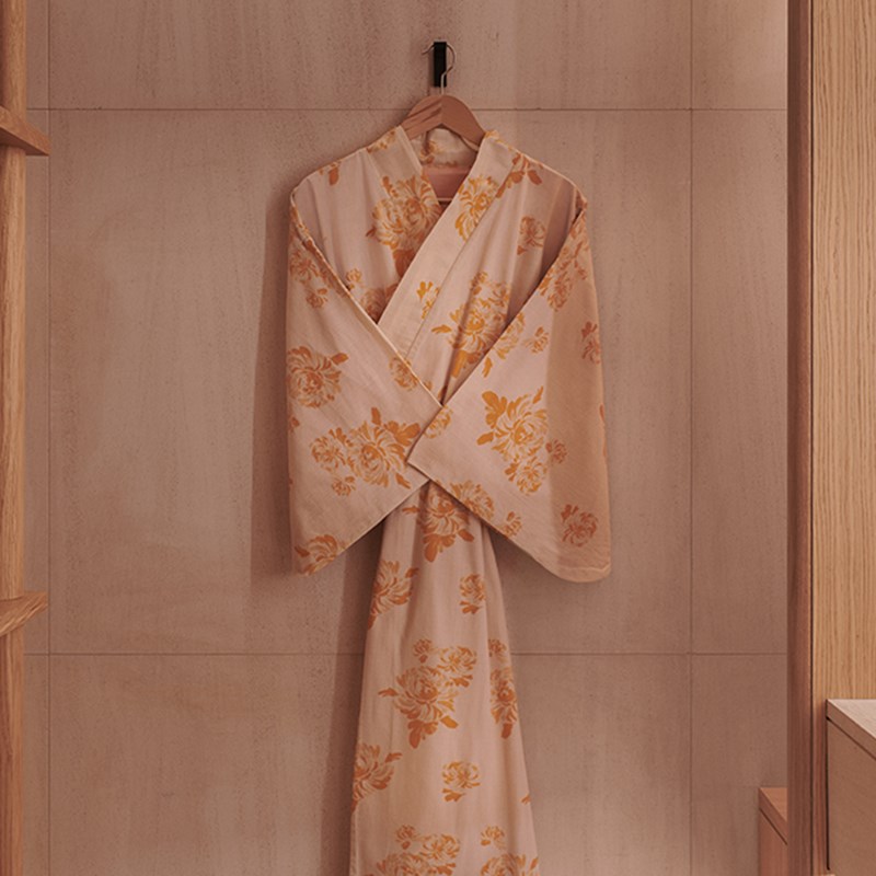 A view of the floral hanging bathrobe, and the soothing atmosphere of Claridge's Spa.