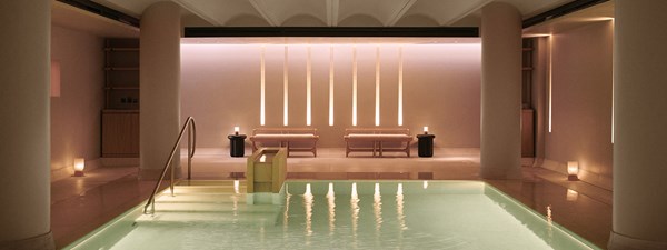 Pool at Claridge's Spa - pool with two sofas in the background.