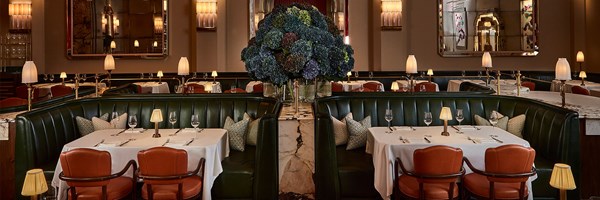 tables, chairs and vase in the centre with hydrangeas