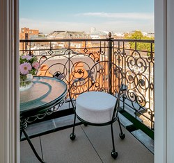 Elegant chair on balcony in Claridge's room